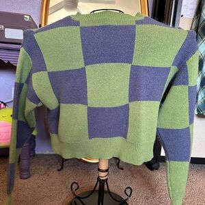 green and blue checkered sweater